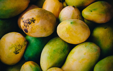 Fresh organic mango fruits in the market