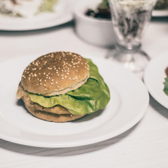 hamburger and other fast food on the table