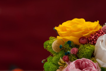 Yellow rose in pink bouquet with hydrangea