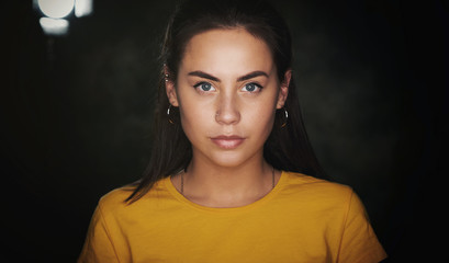 Portrait of beautiful young brunette woman