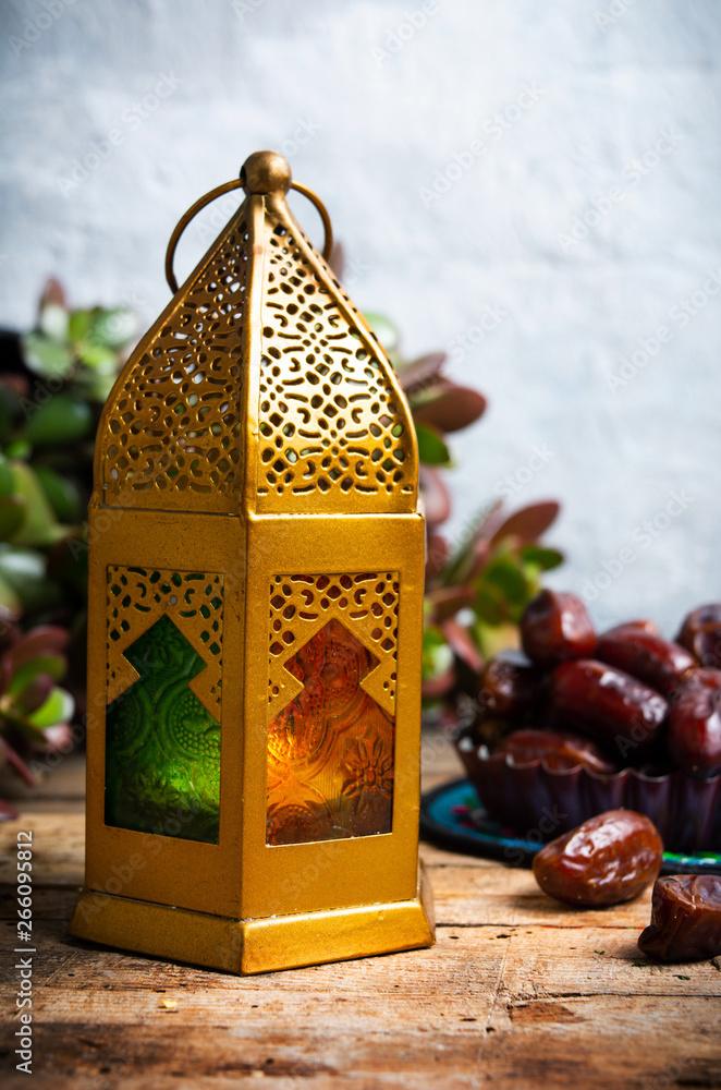 Poster dates and arabic style lamp with copy space