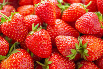 Fresh organic red ripe Strawberry fruit background closeup