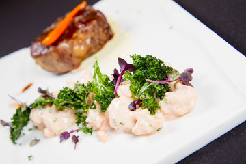 Beef sirloin with sweet potato mousse, curry sauerkraut and fresh thyme sauce