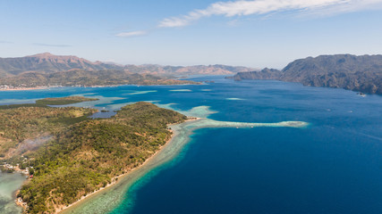 Obraz premium Beautiful archepilag with coral reefs.Tropical islands, view from above.