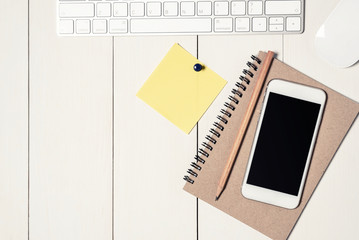 Top view of office equipment on desk.