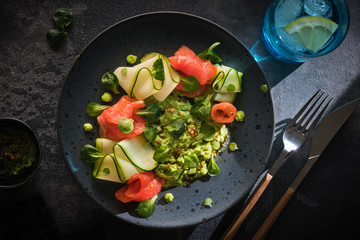 Fresh Avocado, Zucchini and Salmon Salad. Vegetarian breakfast. Healthy lifestyle