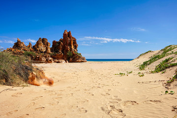 pristine untouched rugged coastline sand dunes