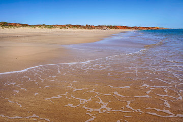 rugged coastline lined by the heavenly blue Indian ocean