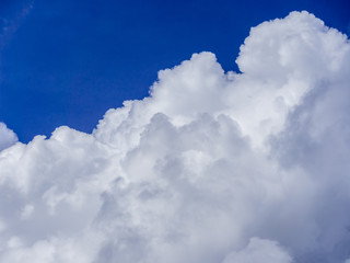 Naklejka na ściany i meble Image of blue sky abstract and fluffy white cloud during the daytime