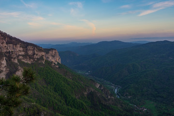 Fototapeta na wymiar Cliffs in Osilnica with river Kolpa in background