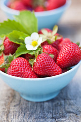 Fresh sweet strawberries in the bowl, selective focus