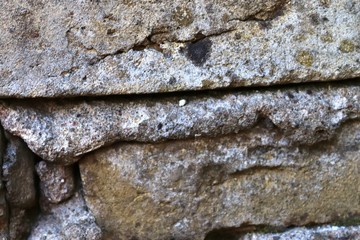 High resolution close up aged and weathered brick walls with red and yellow colored bricks