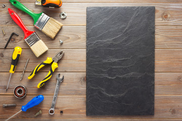 set of tools and instruments at wooden background