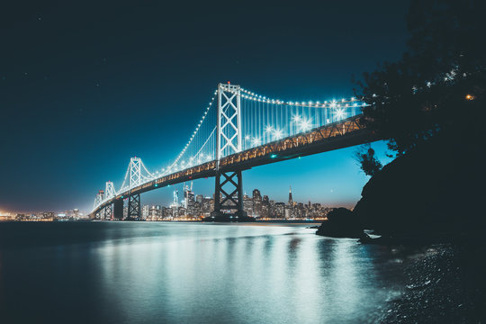 San Francisco skyline with Oakland Bay Bridge in twilight, California, USA