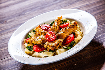 Pasta with meat, sauce and vegetables