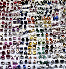 women's rings with precious stones, women's jewelry, a large number of jewelry, background