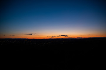 Sunset captured with dark colors over city Brno