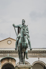 Fototapeta premium Statue of Ferdinando I de' Medici at he Piazza della Santissima Annunziata in Florence, Italy 