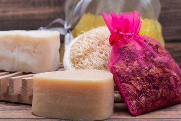 Wooden Soap Holder with a Heart shaped Goat milk Soap, Natural loofah sponge and dried roses on...