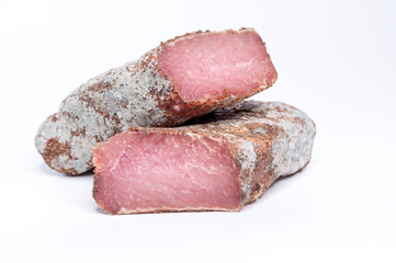 Meat product in section. Bright burgundy meat. Two pieces of meat.