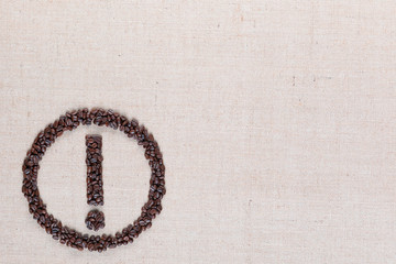 Attention icon on linea texture aligned bottom left.