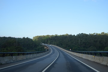 Two-lane road, going into the distance.