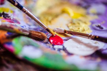 Painting artwork: paint brushes on painting background