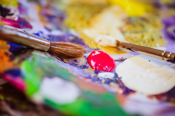 Painting artwork: paint brushes on painting background