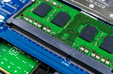 Macro shot of Circuit board with resistors microchips and electronic components. Computer hardware technology. Integrated communication processor. Information engineering. Semiconductor. PCB. Closeup