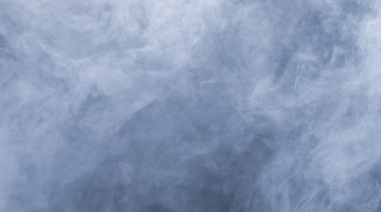 Naklejka premium Smoke and fog in front of black background. Concept graphic elements.