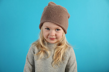 Little fashionable girl in a hat.
