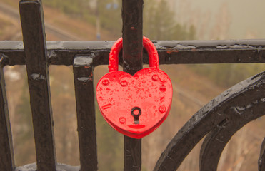 symbolic hearts attached to a metal chain for the wedding