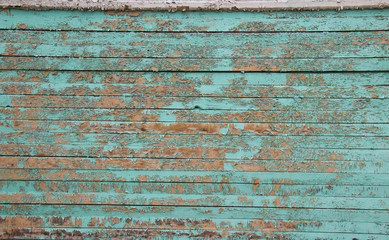background of wooden wall with peeling paint