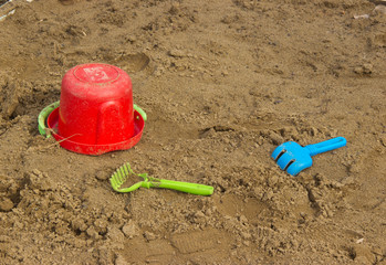 abandoned in the sandbox children's toys