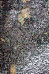 Old cracked rusty peeled colorful paint background texture close-up