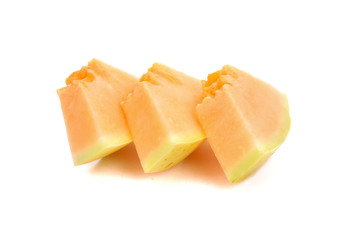 cantaloupe melon slices isolated on white background