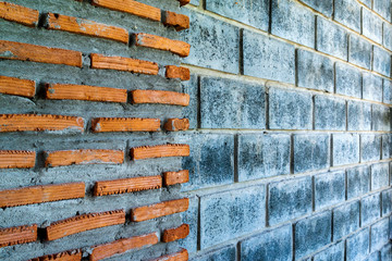 Vintage background of Red brick and concrete blocks