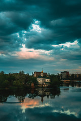 Fototapeta premium Stormy clouds over the Southern Bug river in Vinnytsia, Ukraine