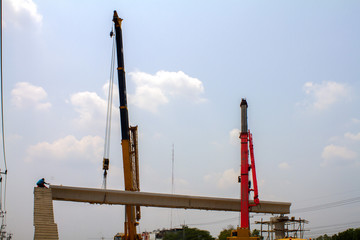 Crane work in the construction site.