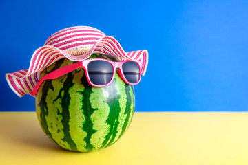 Summer image of watermelon with sunglasses
