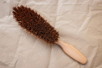 Brush with wooden handle for carpet cleaning