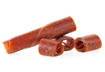 Fruit pastille isolated on a white background. Fruit roll-ups made from raspberry, apples, orange and currant.