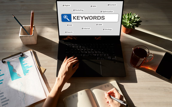 Keywords. SEO, Search Engine Optimization And Internet Marketing Concept On Screen.