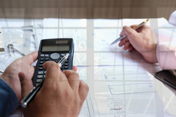 architect engineer team working on house blueprint of real estate project at workplace. construction & building concept