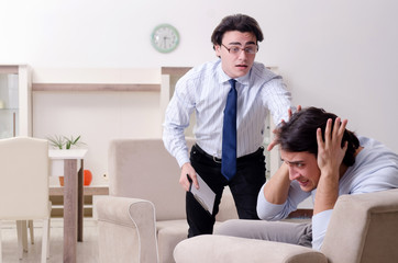 Young male patient discussing with psychologist personal problem
