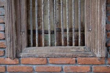 old wooden window & brick wall