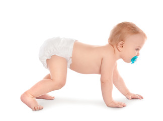 Cute little baby crawling on white background