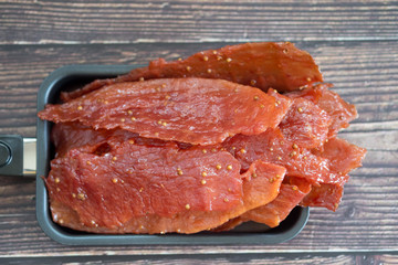 Sliced sheets of sweet dried and crispy pork