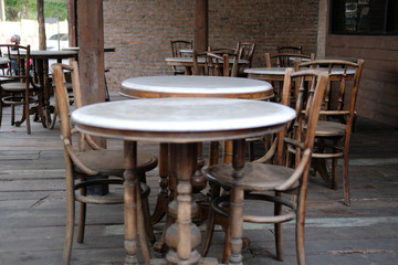 Fototapeta na wymiar wooden chair table in cafe coffee shop restaurant