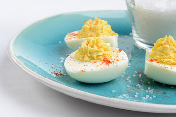 closeup deviled eggs with paprika